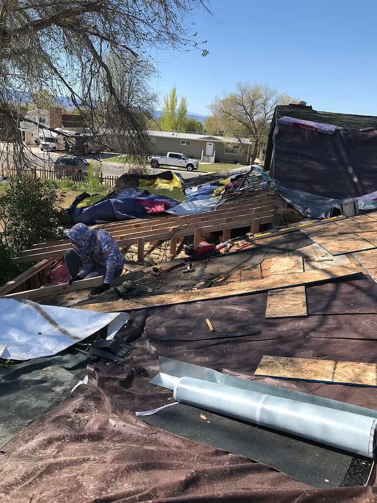 a man working on a roof